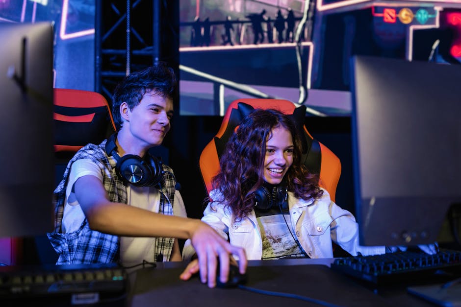 game industry news May 2026 - Teenagers playing a multiplayer video game indoors, enjoying teamwork and strategy.