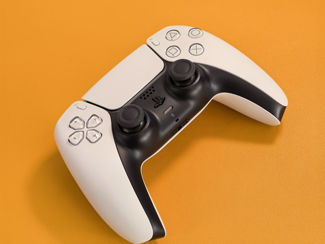 game industry news May 2026 - White video game controller on orange background